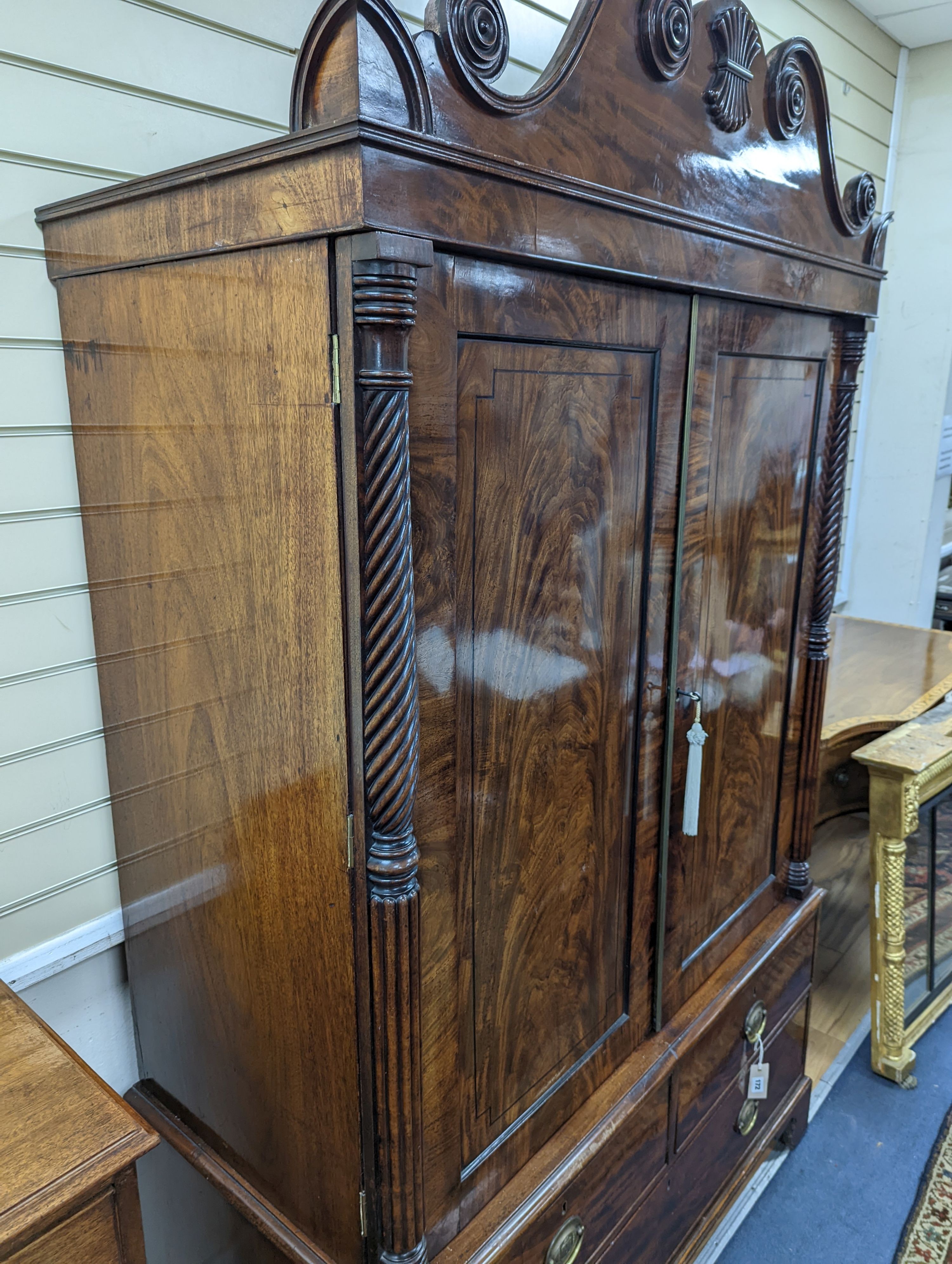 A William IV mahogany hanging cupboard, converted from a linen press, width 120cm, depth 57cm, height 204cm